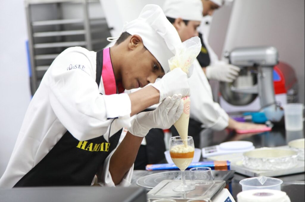 Contestant working on his pastry creation at Junior India Pastry Cup 2024