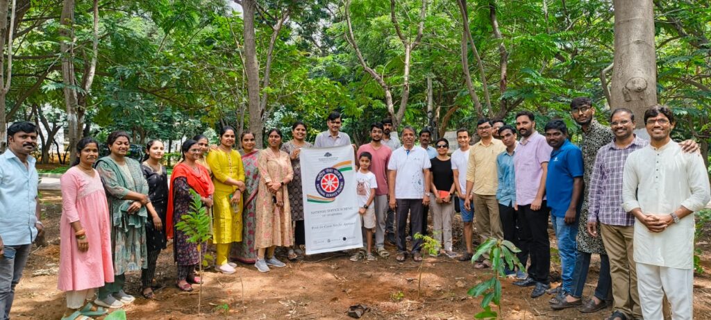 IIITH director and staff planting saplings