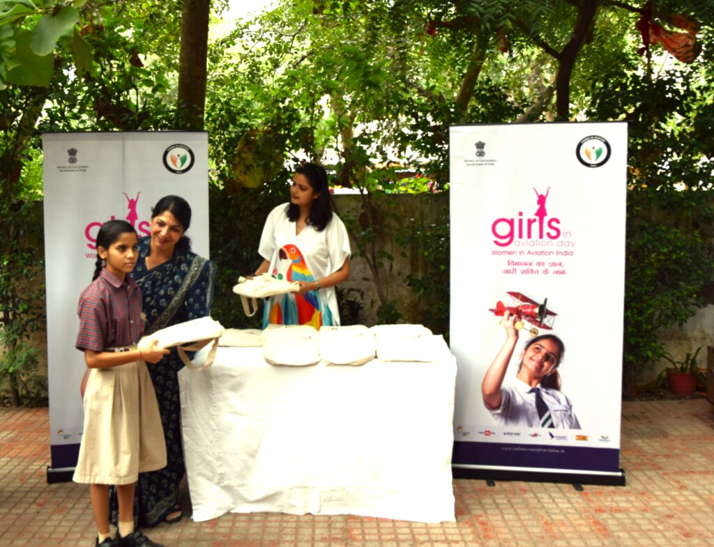 Capt. Anushree Varma, Chief Advisor, Top Crew Aviation and Ms. Sonia Kapila, Senior Soft Skill & Aviation Instructor, Bird Academy distributing merchandise to the girls at Diksha School